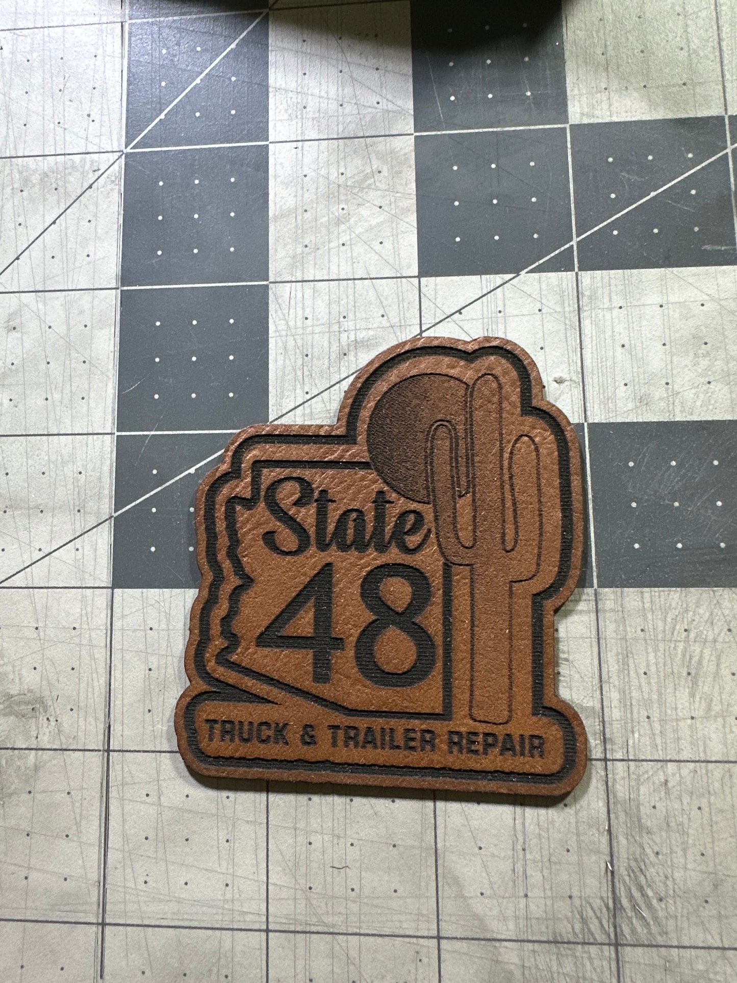 Custom laser engraved patches with custom border cut. With adhesive backing. Size up to 3.5”W x 2.5”H