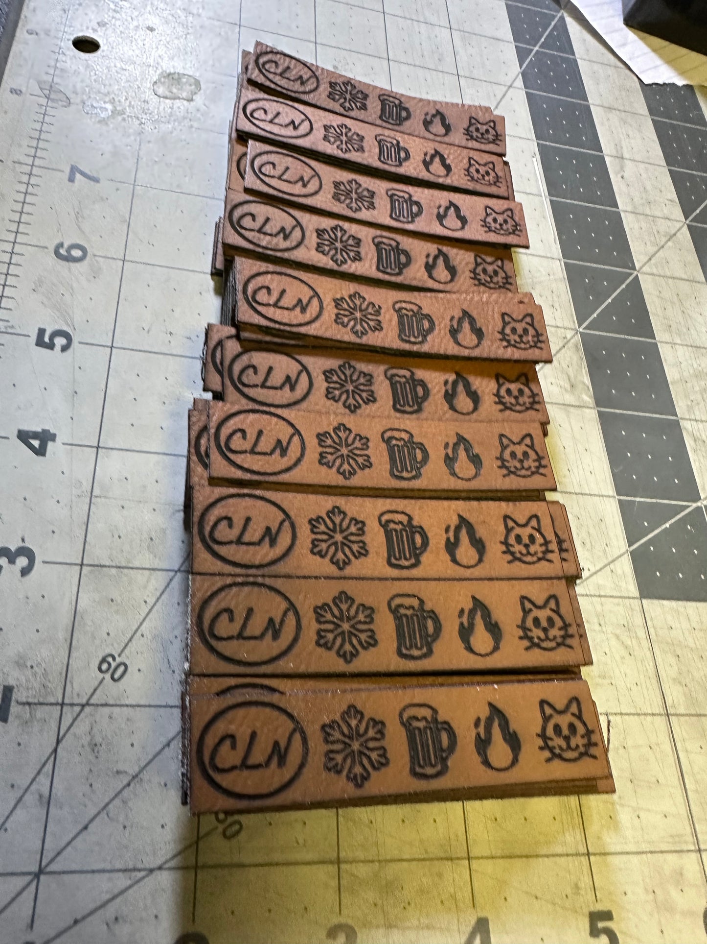 Custom laser engraved patches with custom border cut. With adhesive backing. Size up to 3.5”W x 2.5”H
